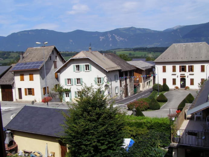 VIEW OF THE GITE AND OF THE MOUNTAINS.
