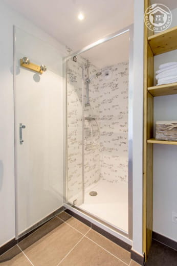 Bathroom with bath and walk-in shower.